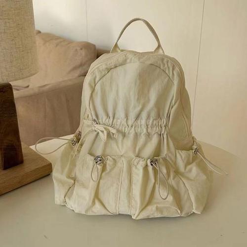 [카멜브라운]일리아나 스트링 포켓 백팩